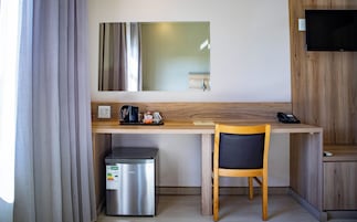 Desk, laptop workspace, free WiFi, bed sheets