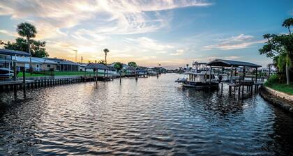 Resort-Style Canal Home w/ Pool & Putting Green - Baywatch