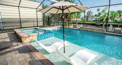 Resort-Style Canal Home w/ Pool & Putting Green - Baywatch