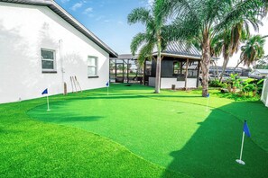 Property grounds - Resort-Style Canal Home w/ Pool & Putting Green - Baywatch (Apollo Beach)