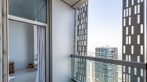 A balcony with a view of high-rise buildings. - Elegant 4BR Marina Penthouse Private Pool (Dubai)