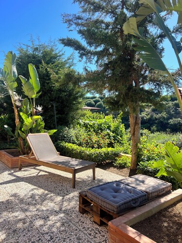 Apartment in villa, in hillside location with sea view.