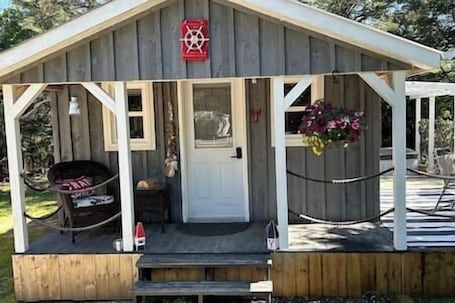 Exterior detail. Cozy Coastal Cabin w/Hot Tub
