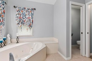 Jetted bath, hair dryer, towels, soap