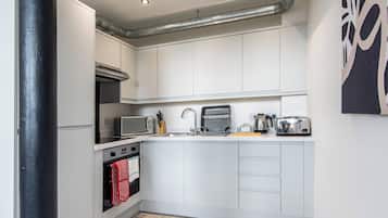 Apartment, 1 King Bed with Sofa bed | Private kitchen | Full-size fridge, microwave, oven, stovetop