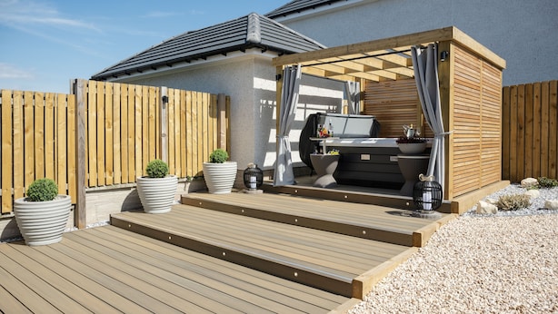 A patio with a barbecue grill, seating area, and potted plants. - Stylish 3-Bed Retreat with Hot Tub & Garden | Near Perth City Centre (Perth)