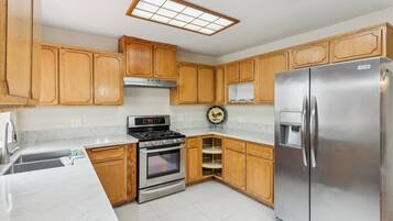 Fridge, microwave, oven, cookware/dishes/utensils