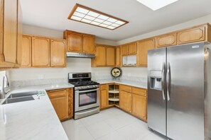 Fridge, microwave, oven, cookware/dishes/utensils