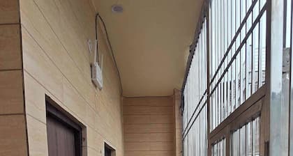 2-bedroom apartment in welcoming Vrindavan with AC, WiFi