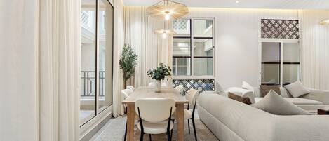 Deluxe Apartment, Balcony | Living area