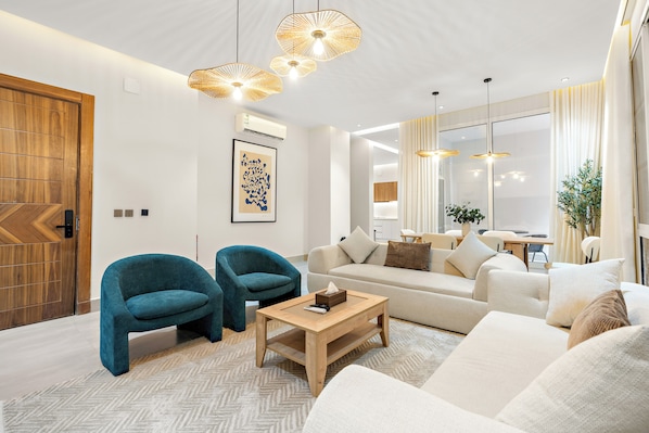 Appartement Deluxe, balcon | Coin séjour