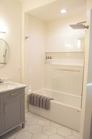 Shower, eco-friendly toiletries, hair dryer, towels