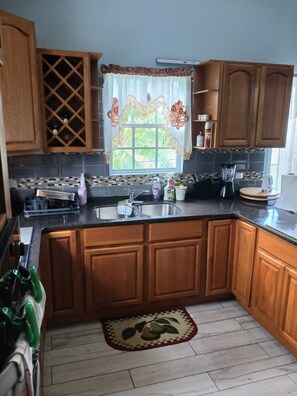 Fridge, microwave, oven, stovetop - 3-bedroom house in, Paynters ,  short walk to the Sir Vivian Richards Stadium. (Piggotts)