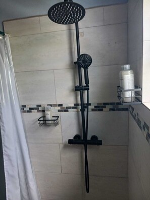 Shower, hair dryer, towels, soap