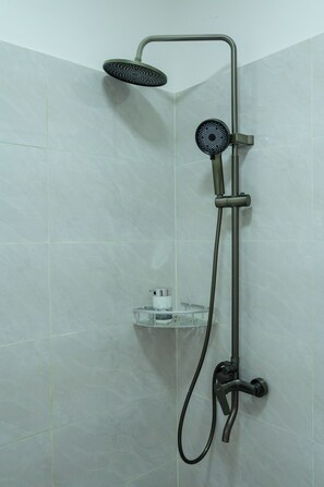 Shower, towels, soap, toilet paper