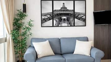 Deluxe Studio, City View | Living area | 80-cm Smart TV with digital channels