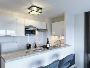 Deluxe Studio, City View | Dining room