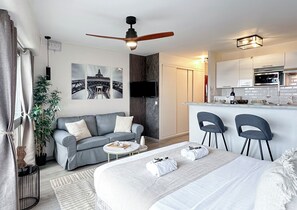 Deluxe Studio, City View | Living area | 80-cm Smart TV with digital channels