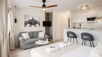 Deluxe Studio, City View | Living area | 80-cm Smart TV with digital channels