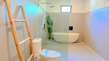 Superior Suite, Park View | Bathroom | Hair dryer, slippers, towels, soap