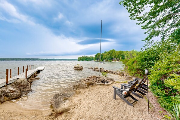 Property grounds - Inviting lakefront home with private dock, sandy beach, and stunning views (Raymond)