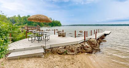 Inviting lakefront home with private dock, sandy beach, and stunning views