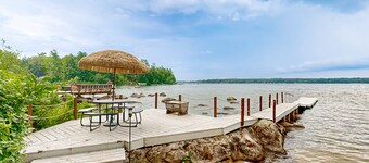Inviting lakefront home with private dock, sandy beach, and stunning views