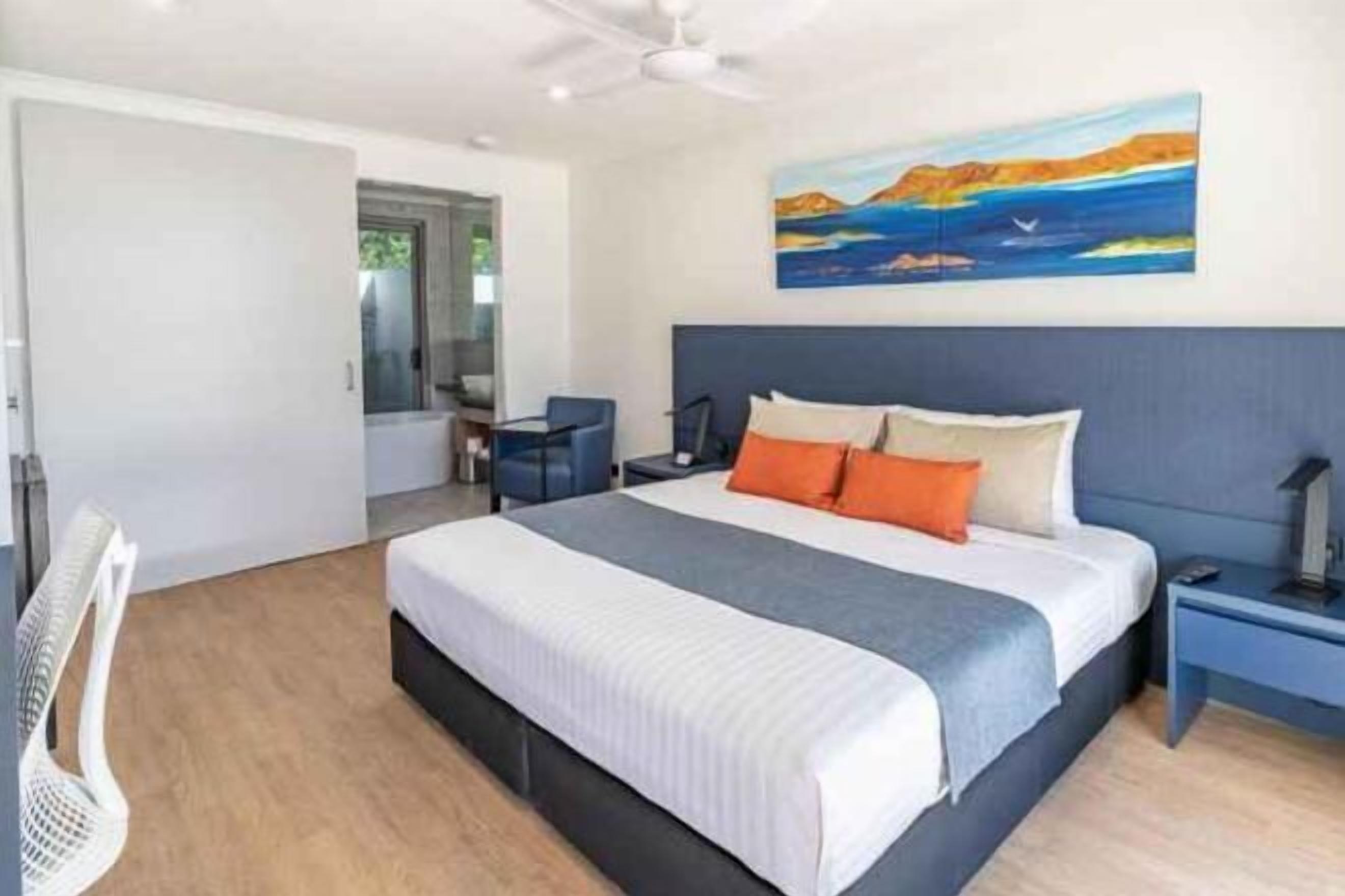 Pillow-top beds, desk, laptop workspace, blackout curtains