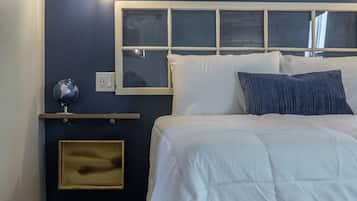 1 bedroom, desk, iron/ironing board, travel crib