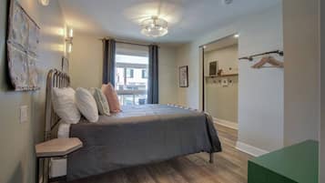 1 bedroom, desk, iron/ironing board, travel crib