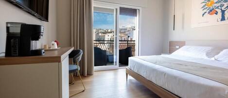 Family Room, Balcony, City View | In-room safe, blackout drapes, soundproofing, free WiFi