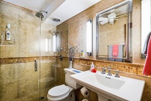 Shower, hair dryer, towels, soap