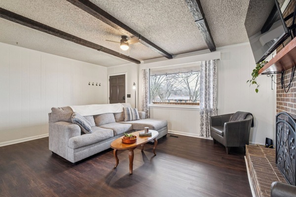 Living room with large bright front window