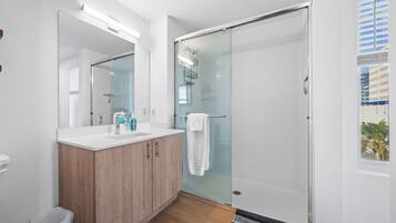 Shower, hair dryer, towels, soap