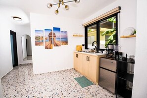 Fridge, microwave, stovetop, coffee/tea maker