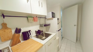 Microwave, stovetop, dishwasher, cookware/dishes/utensils