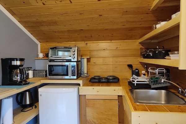 An inviting space for light meal prep or a quiet morning coffee.
