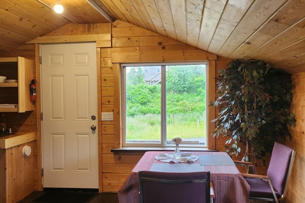 Cozy setup with two seats — extra folding chair available.