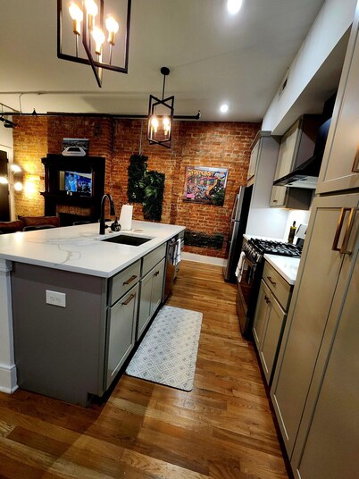 Easy 1st floor access + TQL Stadium + Free Parking!
