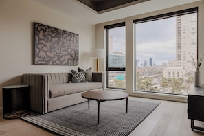 Premium Apartment, 1 Queen Bed with Sofa bed, City View, Corner | Living area | 49-inch Smart TV with digital channels, Netflix, Hulu - Sosuite at The Onyx - Museum District (Philadelphia)