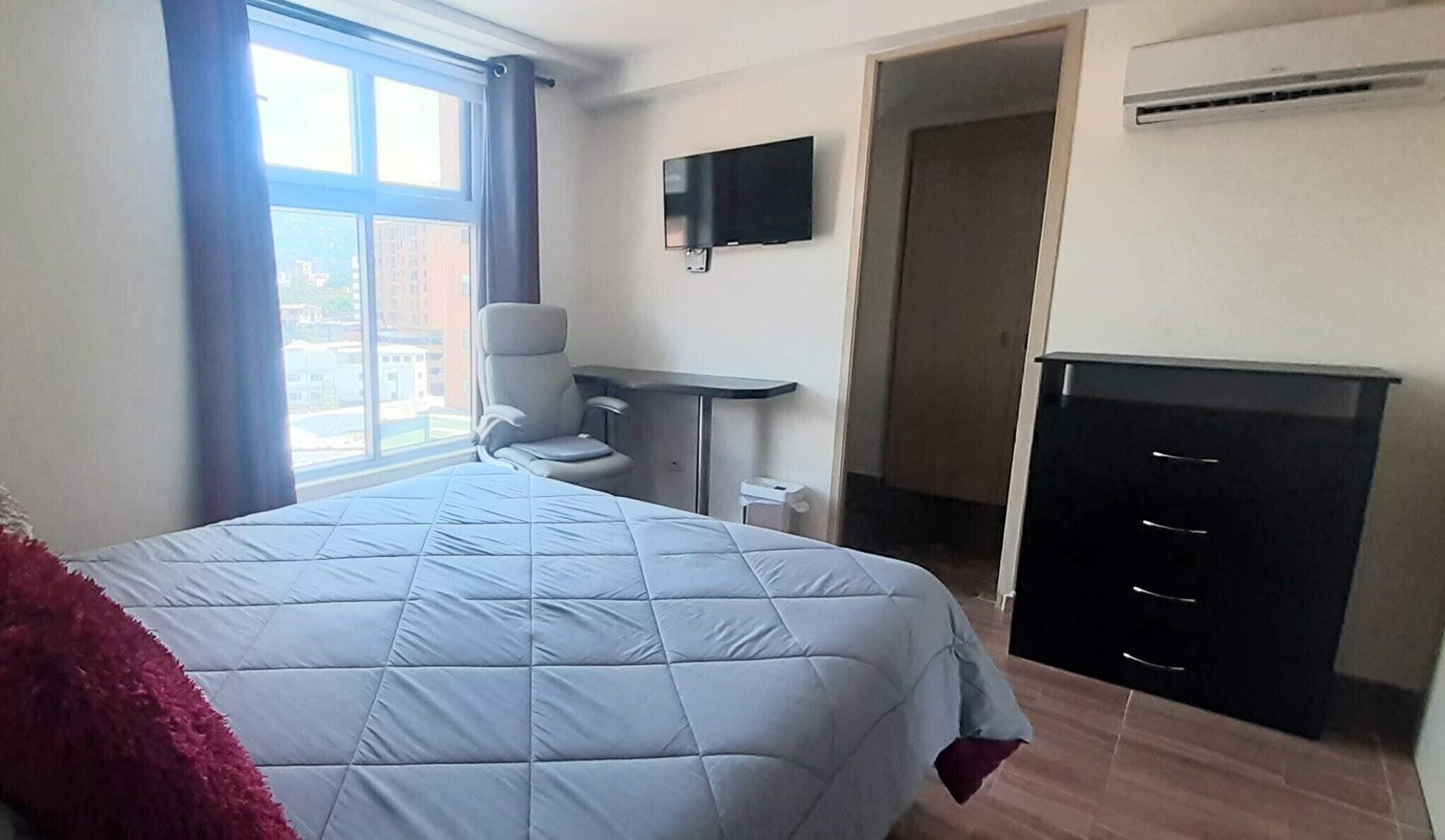 Standard Apartment, City View | In-room safe, desk, laptop workspace, iron/ironing board