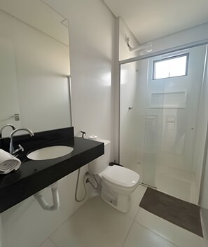 Shower, towels, toilet paper