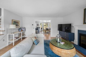 Smart TV, fireplace, table football, books