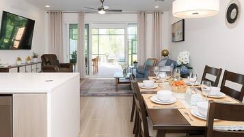 Suite, Patio | Living area | 40-inch Smart TV with digital channels