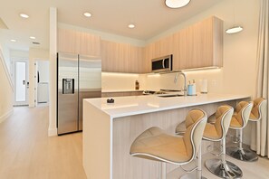 Suite, Patio | Private kitchen | Full-sized fridge, microwave, oven, stovetop