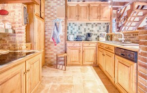 Fridge, stovetop, dishwasher, coffee/tea maker