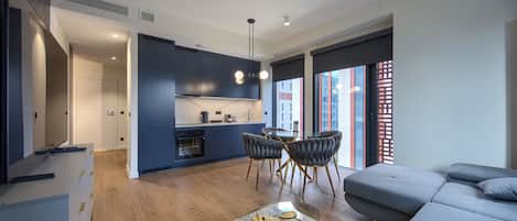 Deluxe Apartment, City View | Laptop workspace, blackout drapes, soundproofing, iron/ironing board