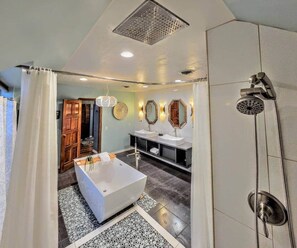 Shower, hair dryer, towels, shampoo