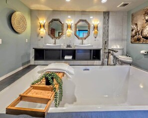 Shower, hair dryer, towels, shampoo