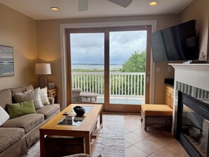 Smart TV, fireplace, books - Bayfront Beauty in Fenwick Island-5BR/4BA Sunset Views/Pier/Pool/Walk to Beach (Fenwick Island)